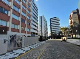 Apartamento Caiobá Pé na areia. Quadra do Mar., хотел в Матинос