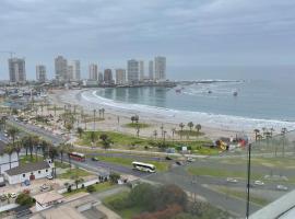 LUJOSO DEPARTAMENTO FRENTE A PLAYA CAVANCHA, hotel in Iquique