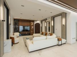 La Maison Resort, cabaña o casa de campo en Doha