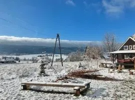 Domek Adam z widokiem na góry Lasówka
