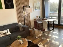 U jelena Harrachov - rodinný apartmán u lesa s garáží