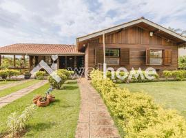 Casa com ampla área verde e piscina em Itupeva, hotel in Itupeva