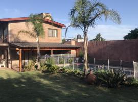 Cabañas Brick House, hotel i Embalse