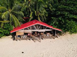 White Beach Front and Cottages, hotel berdekatan Ariel's Point, Buruanga