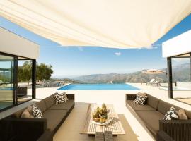 Hill house Spain -villa casa blanca, жилье для отдыха в городе Альмуньекар