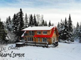 Les Chalets Tourisma - Chalet en bois rond avec spa et lac privé - Le Caribou, boende i Sainte-Catherine