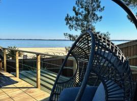 Chalet et Jaccuzy sur la plage, chalet à Biscarrosse