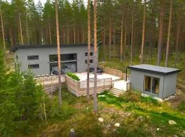 Skogly - Ny stor hytte, Unike Finnskogen