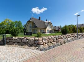 Strandvilla "Babette" - BALO A, direkt am Meer, mit Sauna, Hotel in Lobbe