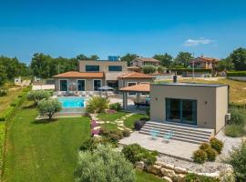 Modern villa Lukas with pool in Vizinada, vacation home in Vranje Selo