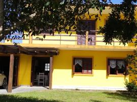 Casa de praia para família - 3 quartos - acomoda até 10 pessoas, будинок для відпустки у місті Трамандаі