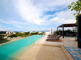 Apartment near the beach, rooftop, pool, sea view.