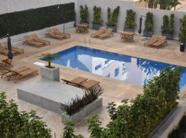 Lovely Apartment With Pool & Gym, готель у місті Кенітра