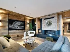 Méribel : Superbe appartement de 140m², 4 chambres, accès pistes, cheminée, WIFI, parking - FR-1-613-25