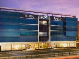 Flora Inn Hotel Dubai Airport, hotel in Garhoud, Dubai
