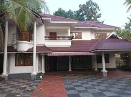 Maydale Homes -annex 2, cabaña o casa de campo en Kottayam