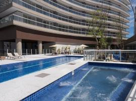 Studio moderno em condomínio de luxo pé na areia, hotel v destinaci Santos