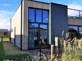 Enkhuizer Strand Cube Elite Estel mit Dachterrasse und Zaun Haus Nr 337, cottage in Enkhuizen