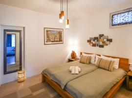 Apartment Opatija with Garden and Seaview, hotel de playa en Opric