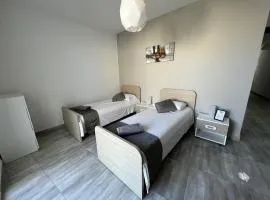 F7-3 Bedroom two single beds shared bathroom in shared Flat