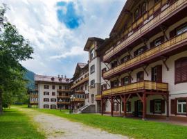 Appartamento Dolomiti 138 Villaggio Turistico, hotel in Carbonin