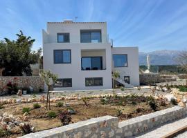 STUNNING MOUNTAIN AND SEA VIEW VILLA ELENI IN VAMOS, Hotel in Vamos