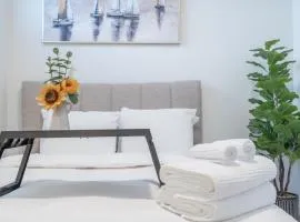 Stylish Getaway 2BD Basement by YMCA and South Health Campus Hospital
