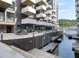 Sørenga MUNCH ved kanalen - egen terrasse uteplass, feriebolig ved stranden i Oslo