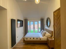 Dave & Kelz Deluxe king size studio room, habitación en casa particular en Builth Wells