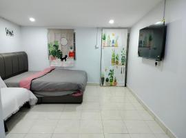 The Big Family Homestay, quarto em acomodação popular em Alor Setar