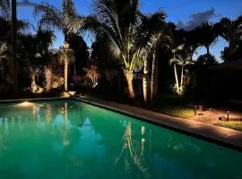 Luxury 8BR Entire Mini-Resort with Heated Pool - Tropical Paradise Near Beach!