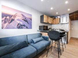 Appartement 2 chambres avec balcon et parking, hotel in Val Thorens