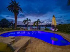 Waterfront Luxury w/ Heated Salt Pool & Golf Cart