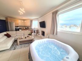 Sunny Home Private Jacuzzi Hydromassage, Fireplace, Acropolis & Lycabettus View, Underground Parking, 300m Metro Peristeri, property with onsen in Athens