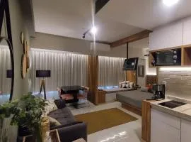 Lindo studio na área central de Poços