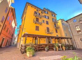 Casa Alpino - Happy Rentals, apartament cu servicii hoteliere din Riva del Garda