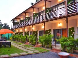 Yogitree Beach Resort & Cafe, hotel di Morjim