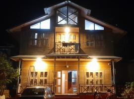 The woods beach house, hotel with parking in Guhagar