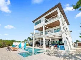 Luxury Seaside Escape ~ Heated Pool w Jacuzzi ~ Elevator ~ Dock ~ Scenic Views