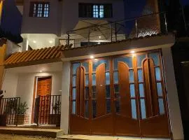 Casa Hospedaje “YURAQ WASI”