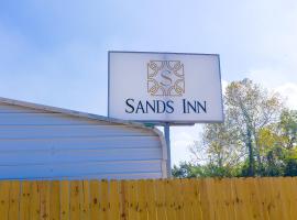 Sands Inn by OYO Winnie, hišnim ljubljenčkom prijazen hotel v mestu Winnie