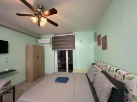Fully Furnished Condo with Balcony Fiber Wi-Fi, family hotel in Lo-oc