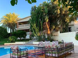 Tiguimi Vacances - Oasis Villas, cadre naturel et vue montagne, hôtel à Agadir