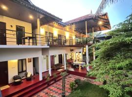 Marari Charlys Homestay, huisdiervriendelijk hotel in Mararikulam