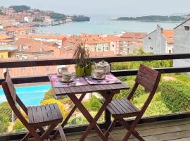 Terraza y piscina con vistas espectaculares al mar Parking cubierto, familiehotel in San Vicente de la Barquera