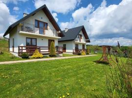 Domki Nad Jeziorem, chalet de montaña en Polańczyk