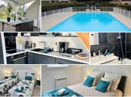 Perle Beach, Petite maison située en bord de plage, piscine., hotel in Guidel