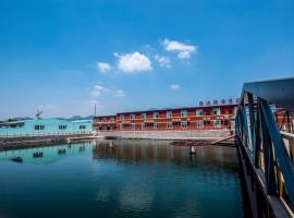 Laoshan Shengda Hotel, hotel u gradu Ćingdao
