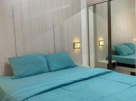 SBroomOfficial Apartemen Riverview FREE WIFI AND NETFLIX โรงแรมที่มีที่จอดรถในTegalgede