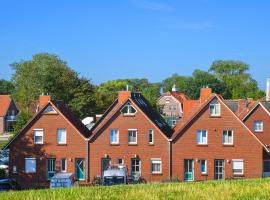 Ferienwohnung Langeoog Inselhaus am Deich, hotel dengan parking di Neuharlingersiel